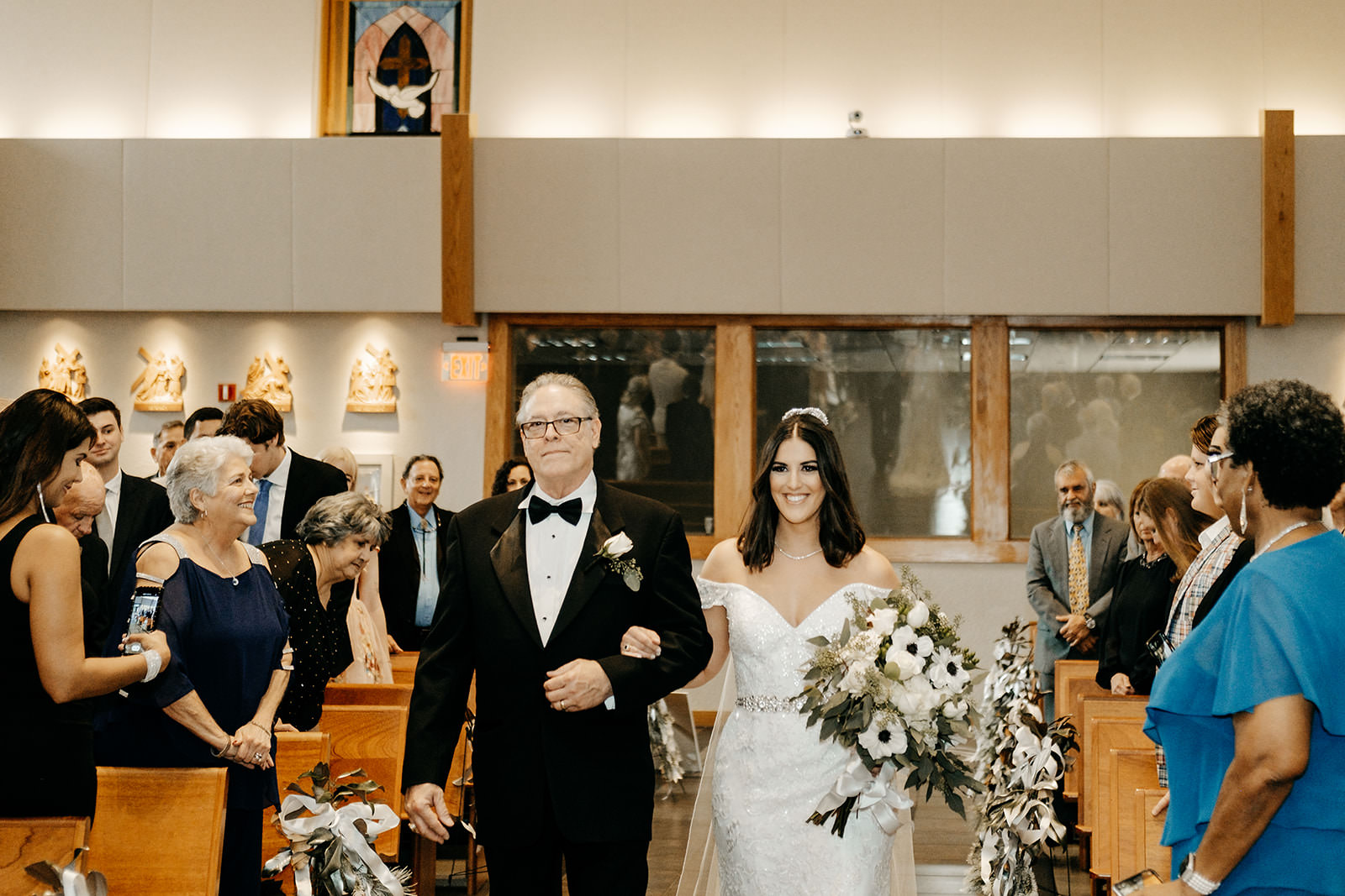Father of the Bride Walks Bride Down the Aisle in Church Wedding