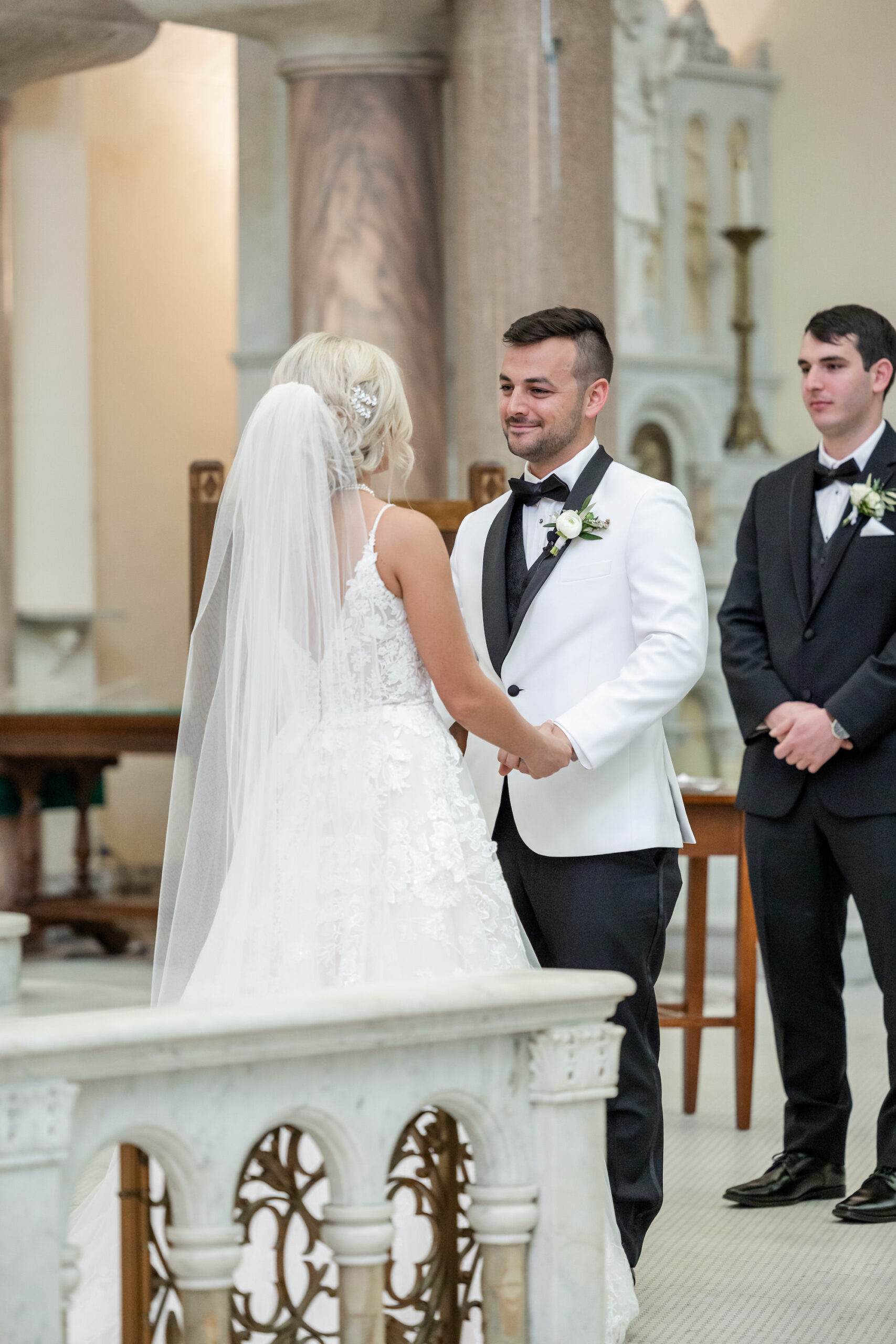Modern Romantic Bride and Groom Exchanging Wedding Vows During Traditional Church Wedding | Tampa Bay Wedding Venue Sacred Heart Catholic Church