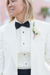 Elegant Blush Pink Same Sex Lesbian Wedding, Bride Wearing White Tuxedo with Black Bowtie and White Rose Boutonniere | Tampa Bay Wedding Photographer Amanda Zabrocki Photography