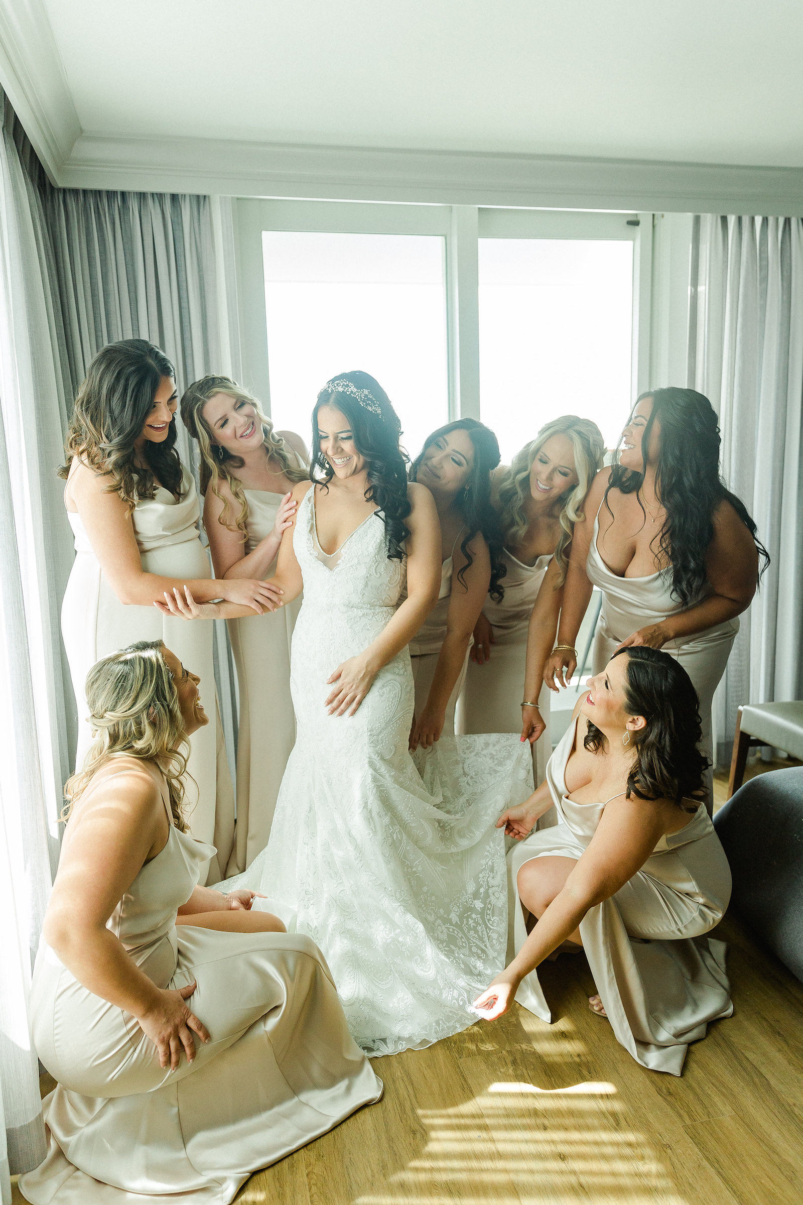 Romantic Bride Wearing Lace Fit and Flare Wedding Dress with Bridesmaids Wearing Gold Dresses | Tampa Bay Wedding Hair and Makeup Femme Akoi Beauty Studio | Bridesmaids Attire Bella Bridesmaids
