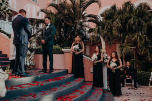 Bridesmaids in Black Floor Length Dresses at St. Petersburg Wedding Ceremony