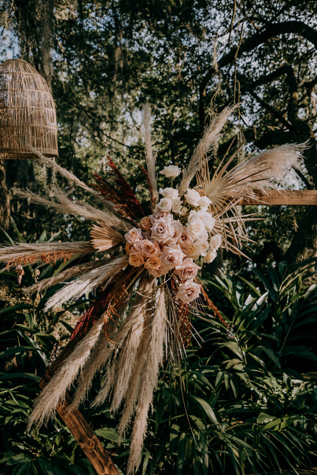 Boho Vintage Wedding Ceremony Decor, Neutral Pampas Grass, Blush Pink and White Roses, Dried Palm Leaves, Terracotta Flower Arrangement on Geometric Hexagon Wooden Arch | Tampa Bay Wedding Planner Stephany Perry Events