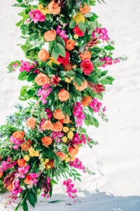 Vibrant Colorful Wedding Ceremony Decor, Circular Round Arch with Greenery, Orange and Yellow Roses, Pink Flowers, Greenery