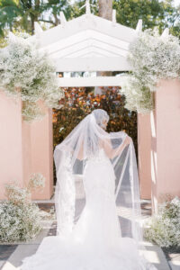 Cathedral Lace Wedding Veil with Baby's Breath Ceremony Decor | St. Pete Wedding Florist Bruce Wayne Florals