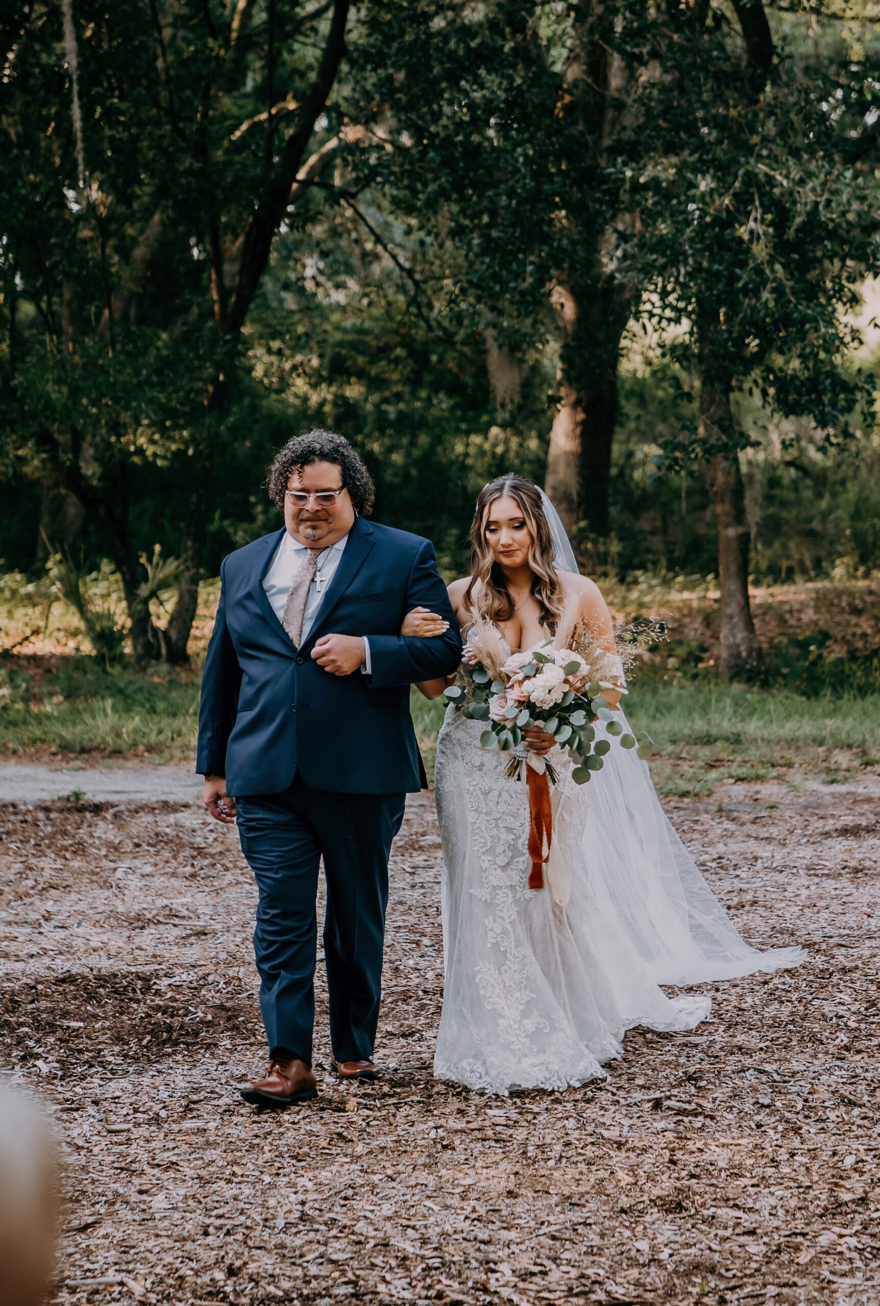 Boho Vintage Bride Walking with Father Down the Wedding Ceremony Aisle | Tampa Wedding Venue Mill Pond Estate