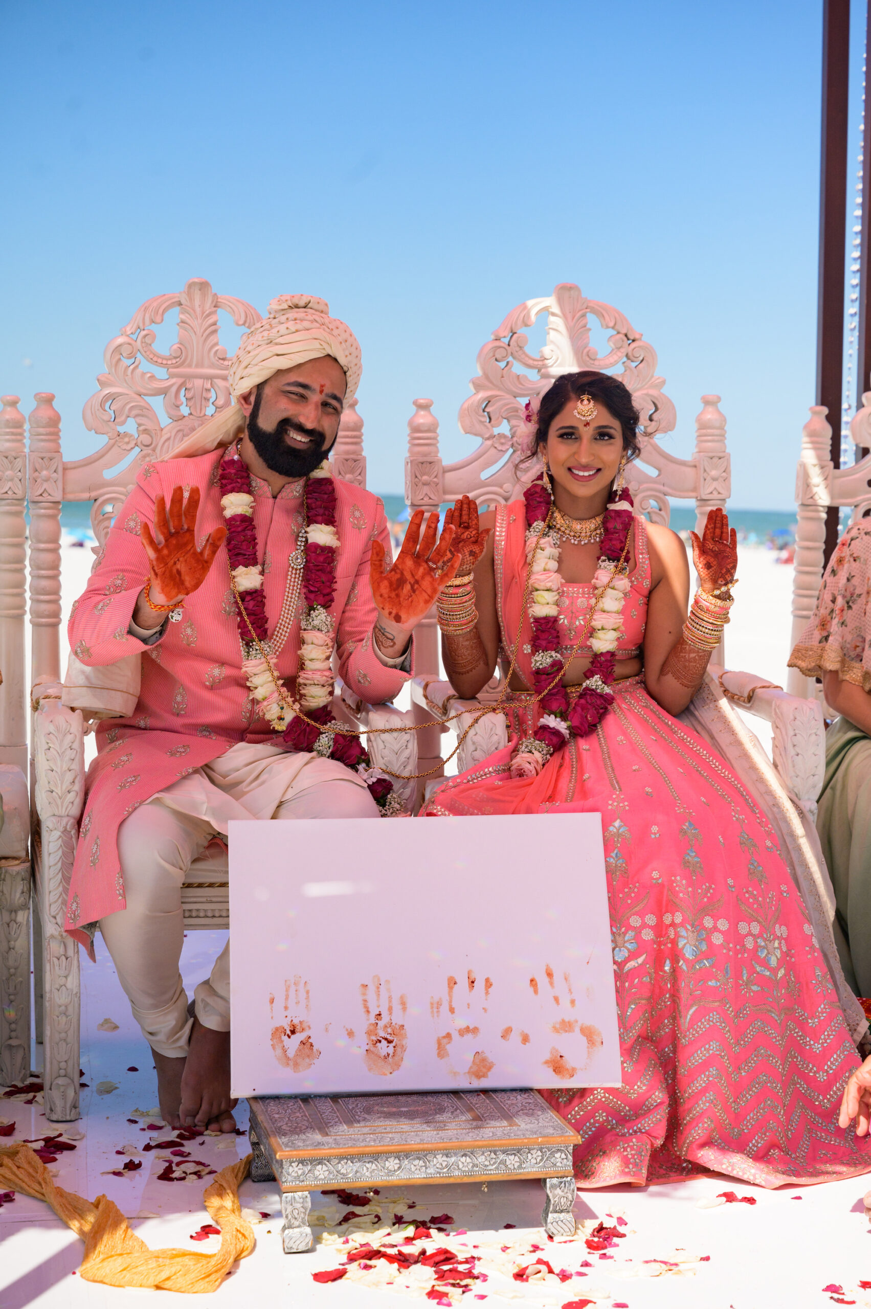 Bride and Groom Under Mandap Altar During Beachfront Indian Wedding Ceremony | Tampa Bay Destination Wedding Venue Hilton Clearwater Beach