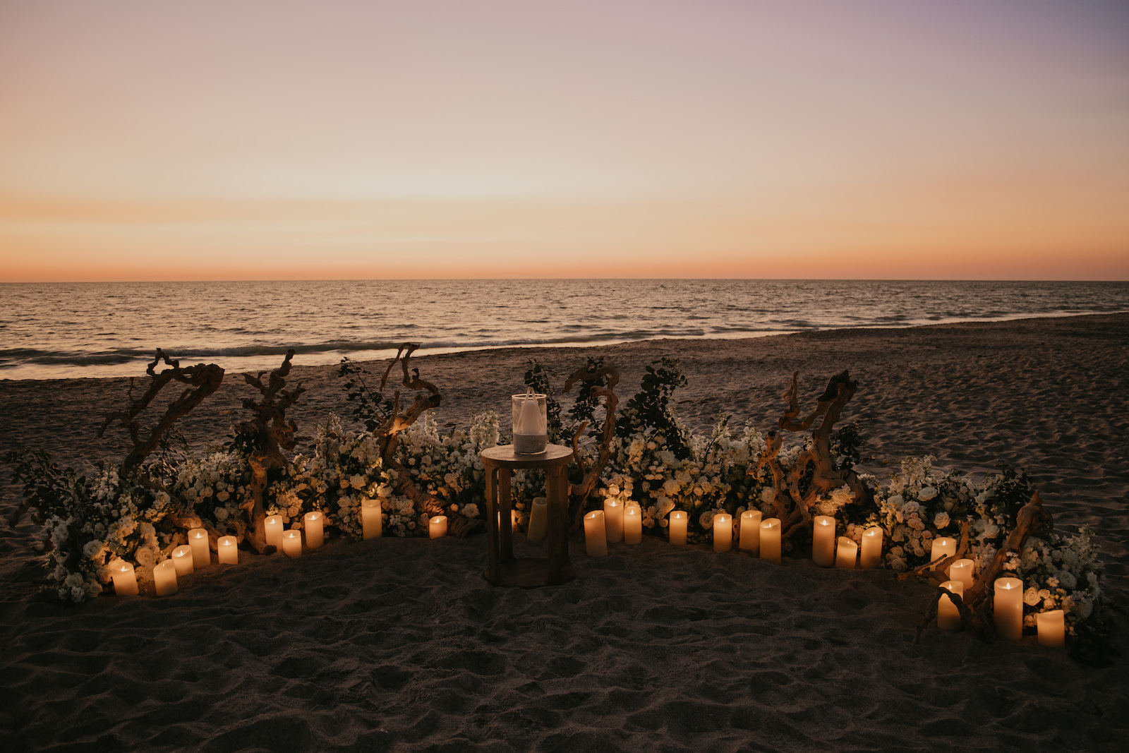 Sunset Romantic Driftwood Candle Light Beach Wedding Ceremony Decor Inspiration | Hotel Venue Longboat Key Zota Beach Resort