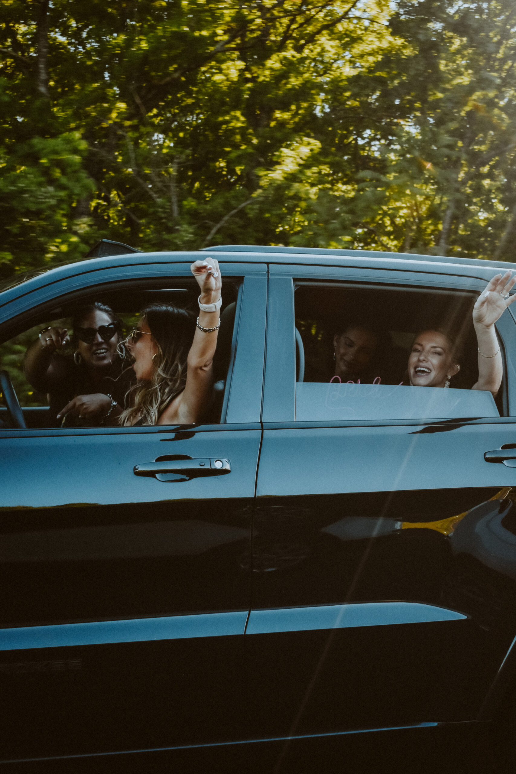 Bride and Bridal Party Driving in Car During Bachelorette Party in the Hamptons | Photographer The Gadabouts Captures