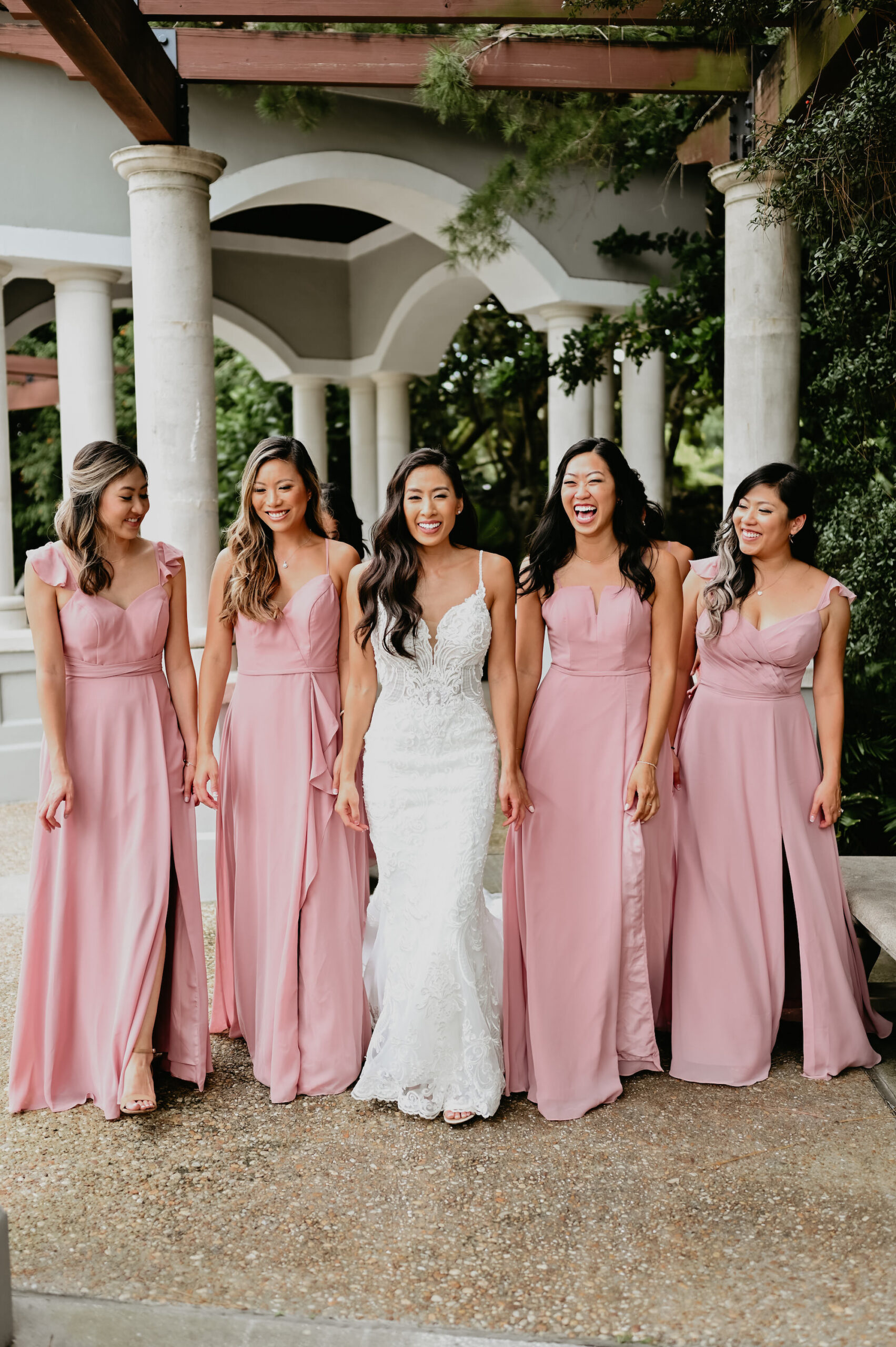 Bride with Bridesmaids in Floor Length Pink Bridesmaids Dresses Portrait