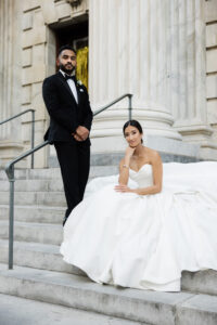 Classic Timeless bride and Groom Wedding Portrait on Steps of Downtown Tampa Wedding Venue Le Meridien
