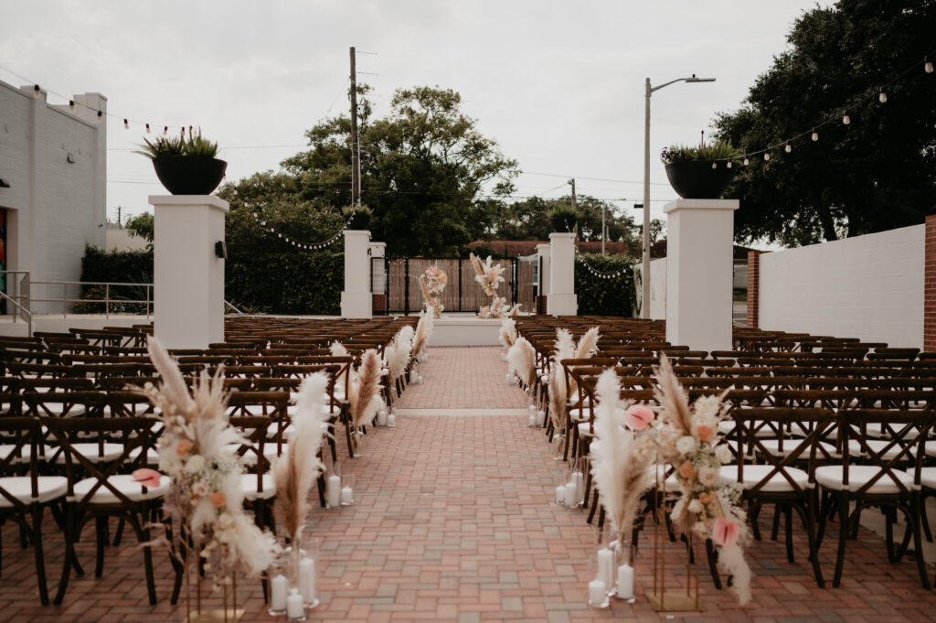 Boho Pampas and Pink and Cream Floral Decor Wedding Ceremony | Florida Wedding Venue Haus 820 | Tampa Florida Rentals A Chair Affair