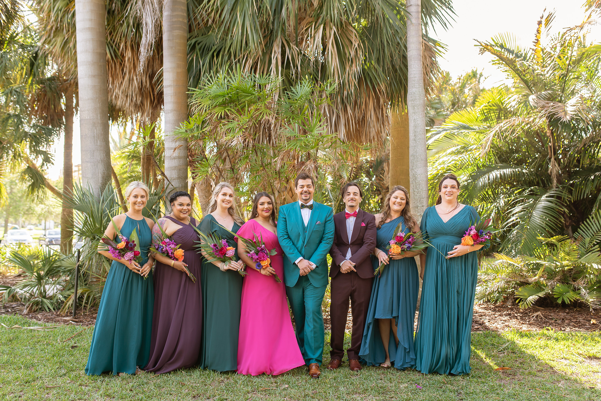 Groom with Wedding Party in Jewel Toned Bridesmaids and Groomsmen's Suits | Florida Wedding Photographer Kristen Marie Photography