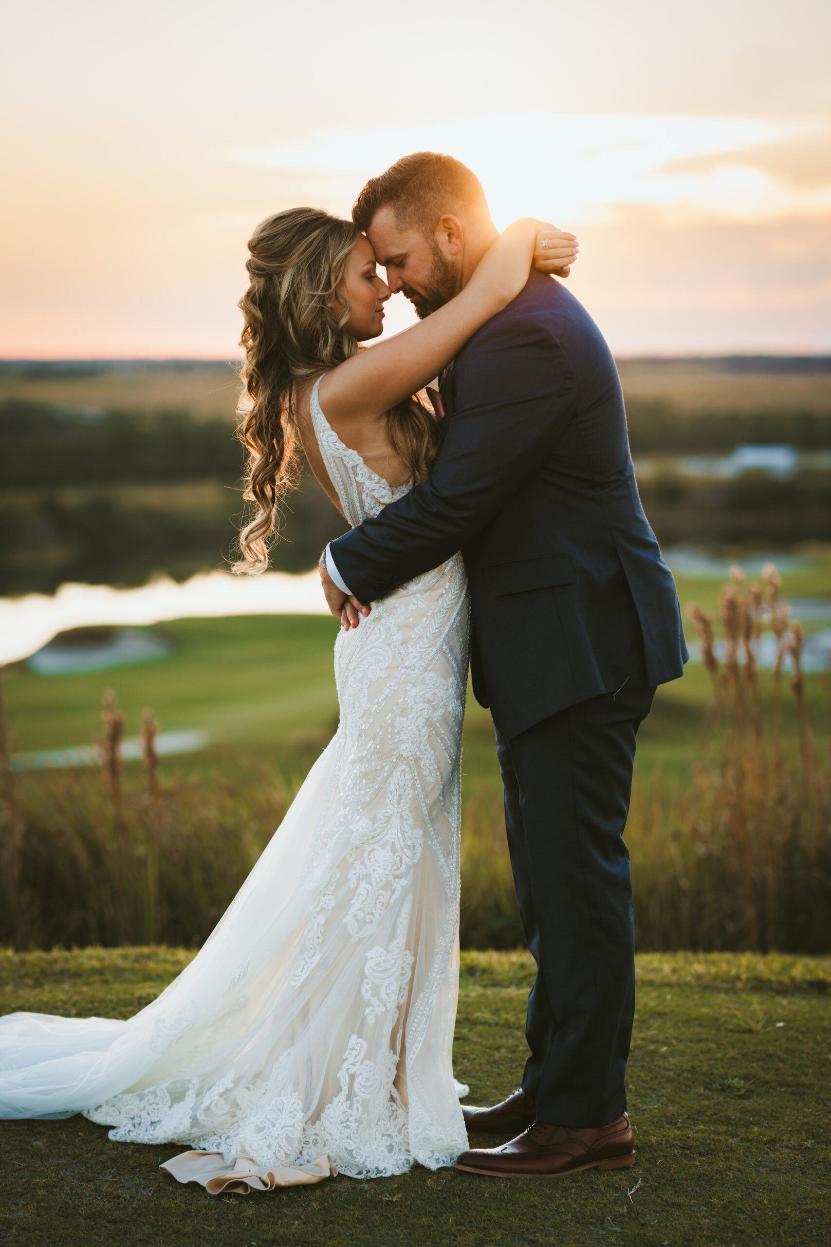 Bride and Groom Intimate Forehead Touch Golf Course Wedding Portrait | Tampa Florida Photographer Mars and The Moon Films