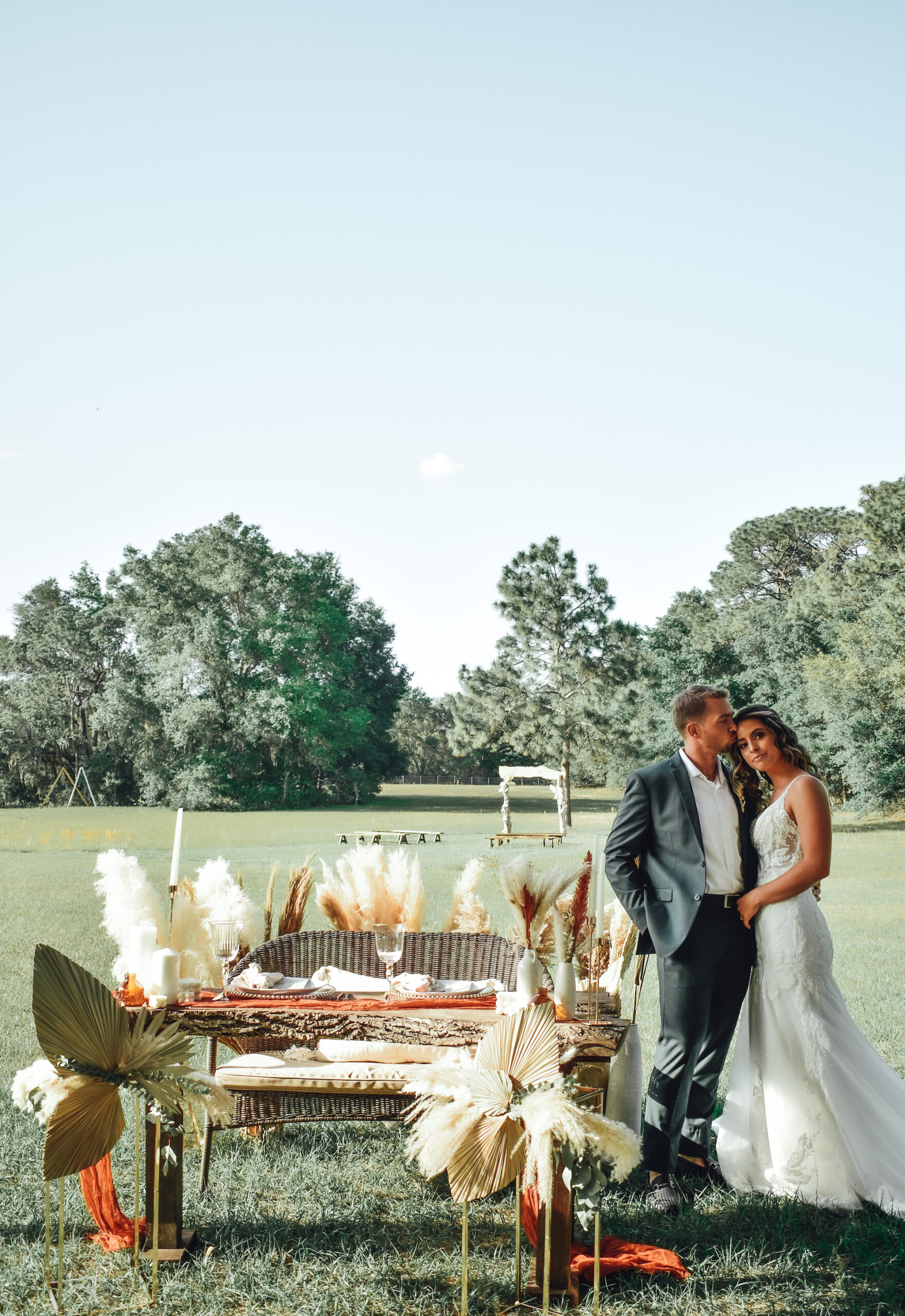Boho Wedding Reception Ideas | Natural Florals Sweetheart Table with Pampas and Dried Leaves Wedding Decor | Tampa Bay Wedding Planner Kelci Leigh Events