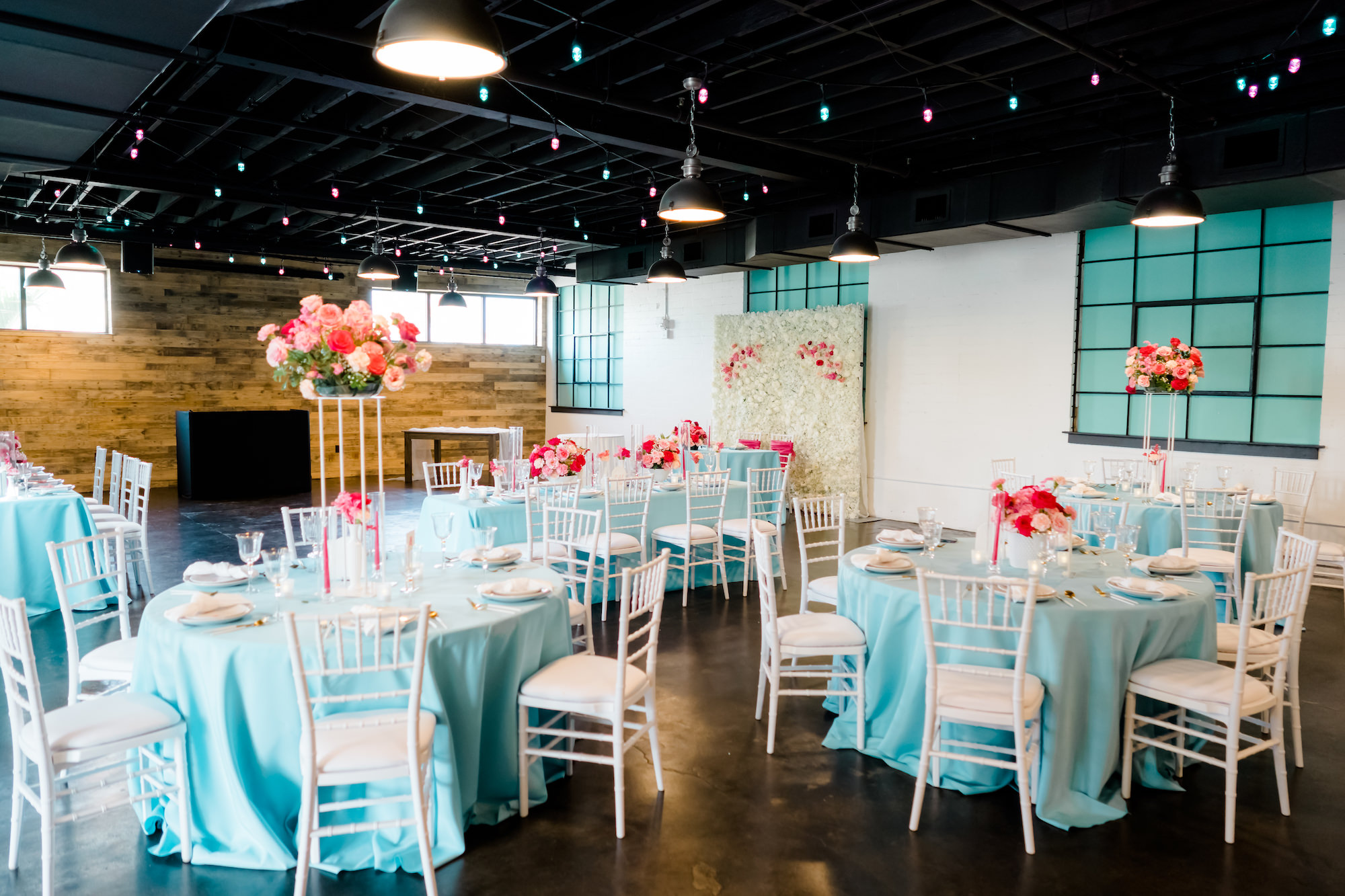 Summer Wedding Reception Decor, Turquoise Table Linens, White Chiavari Chairs, Pink and Fuchsia Floral Centerpieces | Tampa Bay Wedding Venue The West Events | White Chair Rentals Gabro Event Services