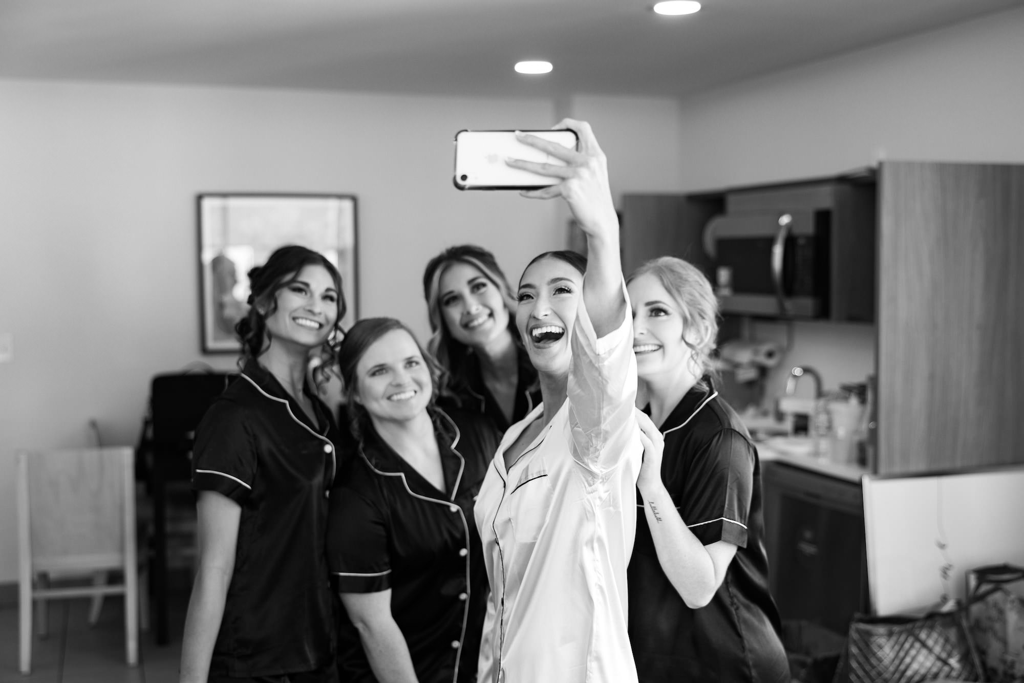 Tampa Bay Bride Taking Selfie with Bridesmaids While Getting Wedding Ready | Tampa Wedding Hair and Makeup Femme Akoi Beauty Studio