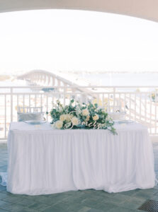 White Linen Sweetheart Table with Greenery and White Florals Tablescape | Tampa Rentals Gabro Event Services
