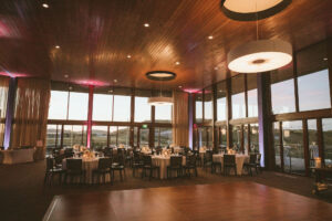 Indoor Reception with Wooden Tables | Streamsong Resort and Golf Course