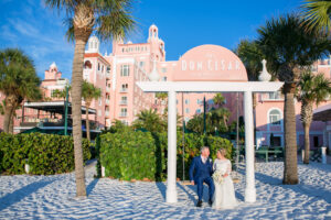 Classic Bride and Groom on Beach of St. Pete Historic Wedding Venue The Don CeSar | Wedding Photographer Carrie Wildes Photography