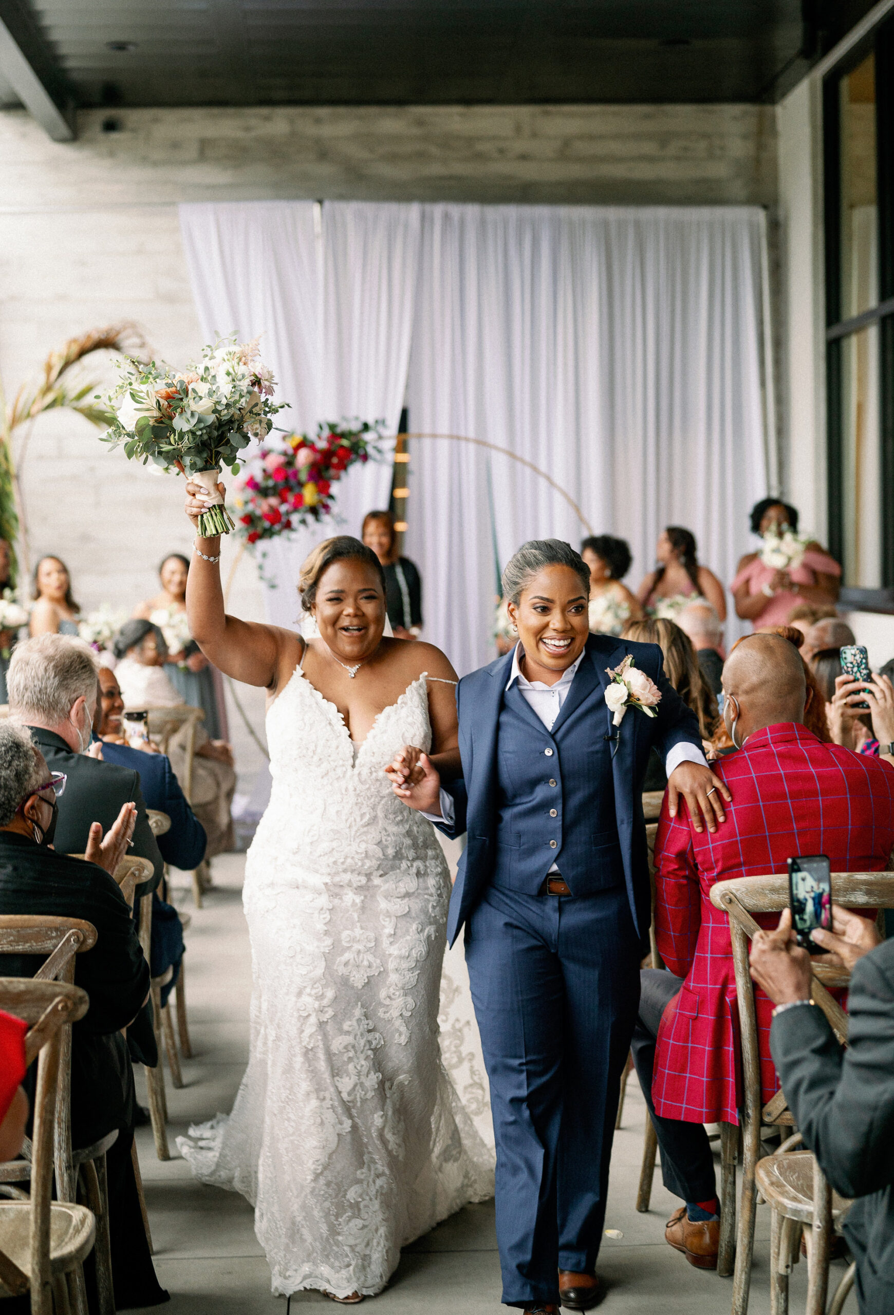 Vibrant Same Sex Lesbian Wedding, Brides Exchanging Wedding Vows | Tampa Bay Wedding Photographer Dewitt for Love Photography | Industrial Modern Wedding Venue Hyde House