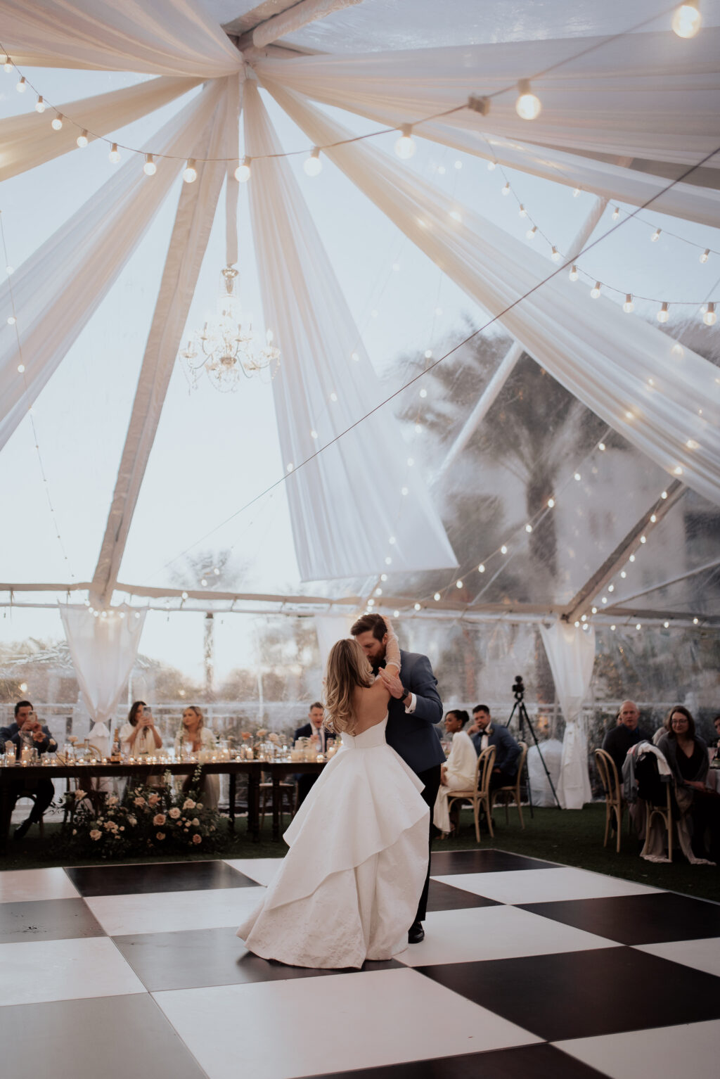 Bride and Groom First Dance | Black and White Checkered Dance Floor | Clearwater Wedding DJ Grant Hemond and Associates | Clearwater Planner Elegant Affairs By Design