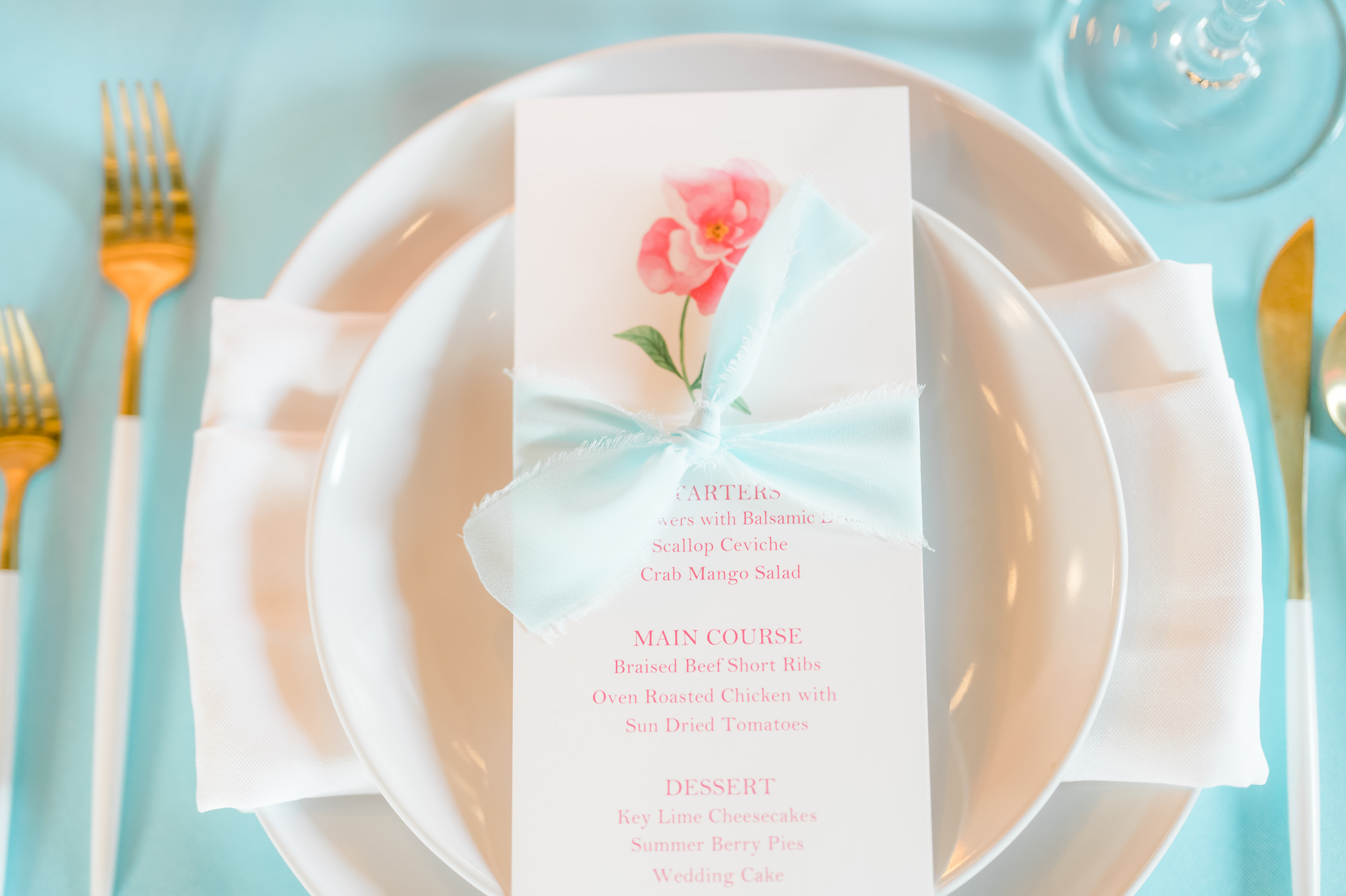 Whimsical Wedding Reception Decor, White China Plates, White and Floral Menu, Pink Candlestick, Gold and White Candlestick | Tampa Bay Wedding Rentals Gabro Event Services | Wedding Stationery Sadgebrush Designs