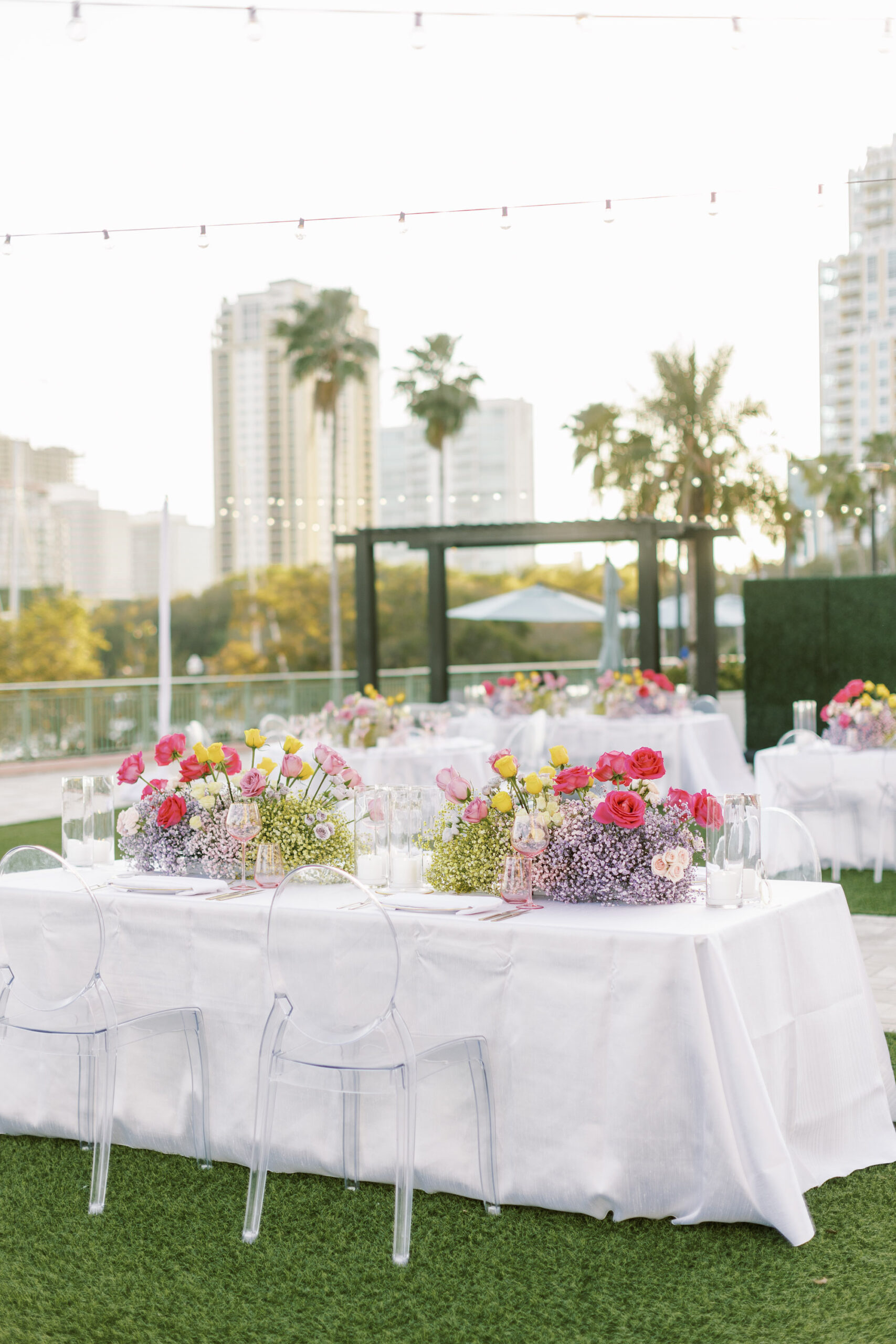 Romantic Spring Whimsical Reception Tablescape Ideas with Ombre Red and Purple Centerpieces and Ghost Chairs | Tampa Bay Florist Bruce Wayne Florals | Rentals Gabro Rental Services | Venue The Vinoy | Planners Parties a la Carte