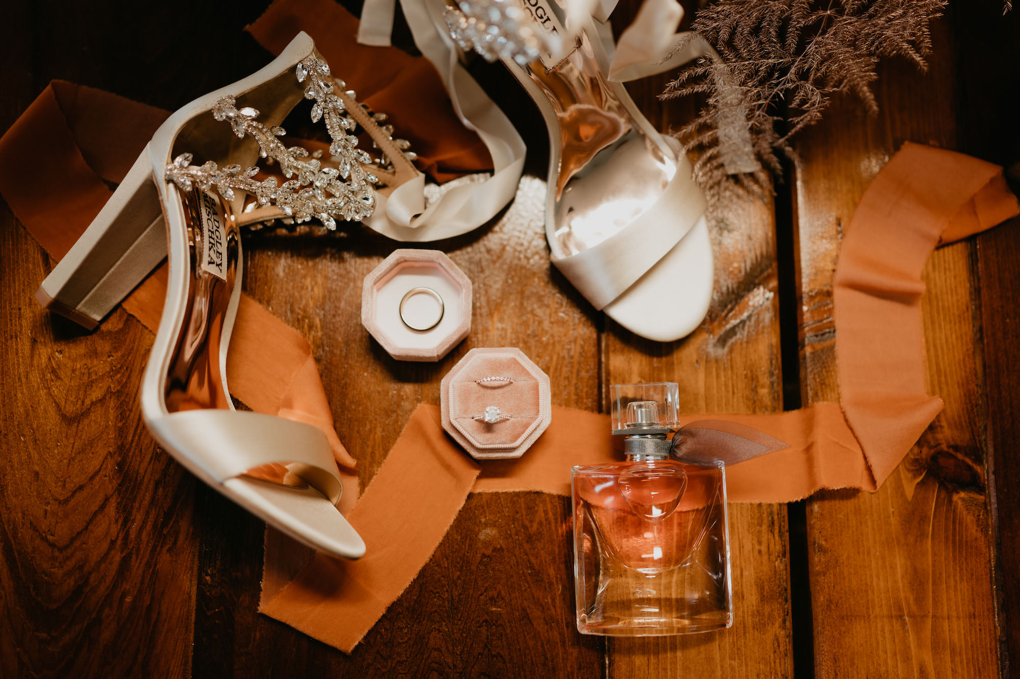Boho Flat Lay with Blush Engagement Ring Box, Perfume, and Satin Open Toed Wedding Shoes