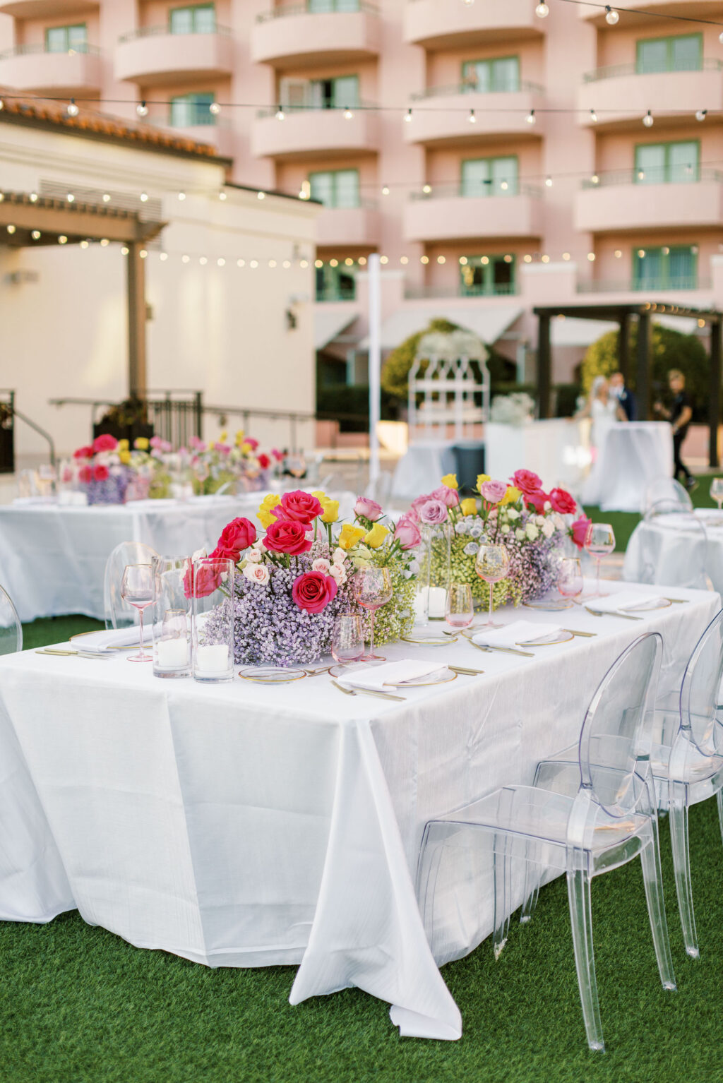 Romantic Spring Whimsical Reception Tablescape Ideas with Ombre Red and Purple Centerpieces and Ghost Chairs | Tampa Bay Florist Bruce Wayne Florals | Rentals Gabro Rental Services | Venue The Vinoy | Planners Parties a la Carte