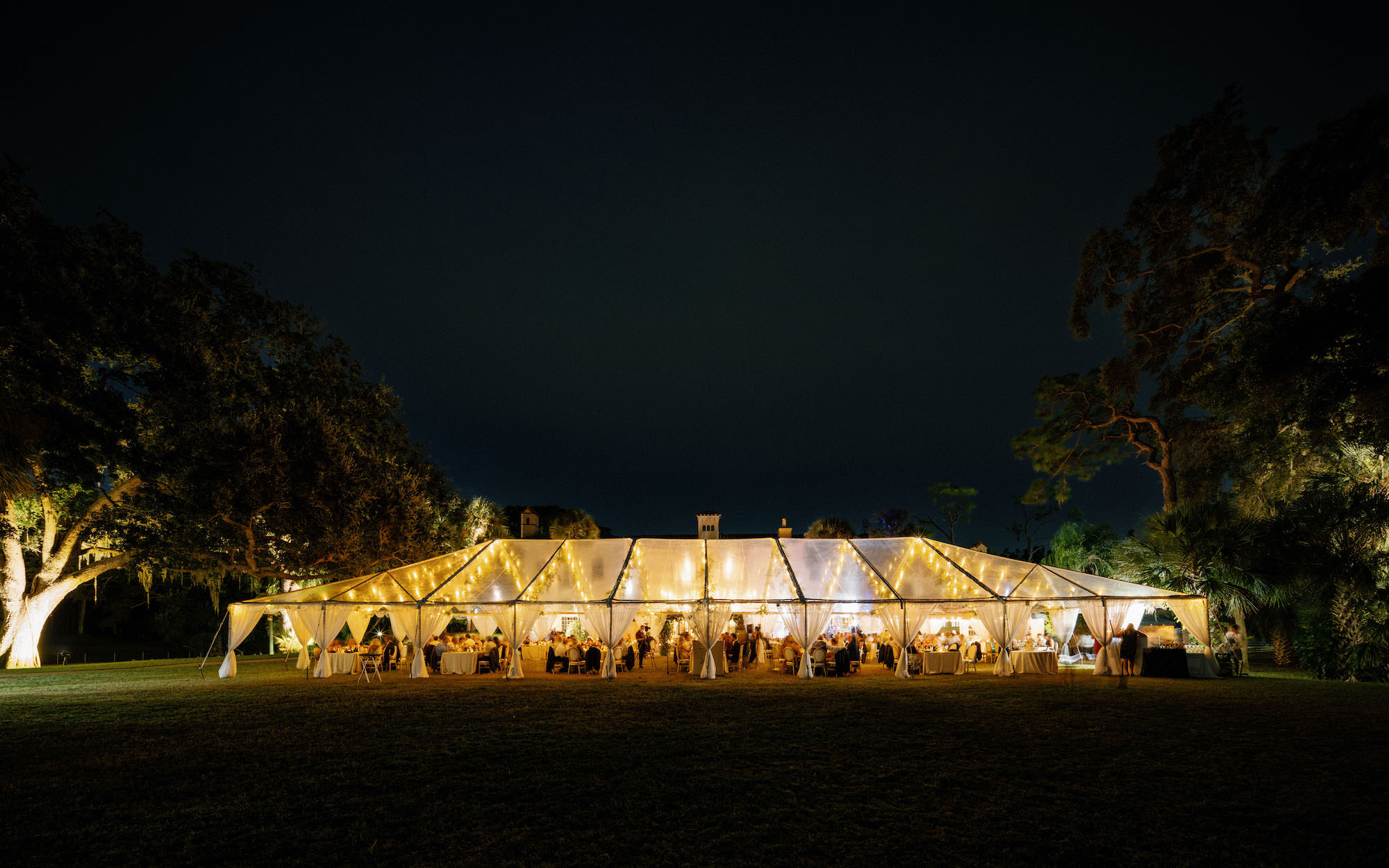 Luxurious Classic Outdoor Clear Tent Wedding Reception Nighttime Wedding Portrait | St. Pete Wedding Venue Powel Crosely Estate