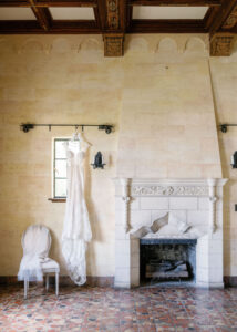 Luxurious Classic Wedding, Lace Wedding Dress Hanging in Getting Wedding Ready Room | St. Pete Powel Crosley Estate