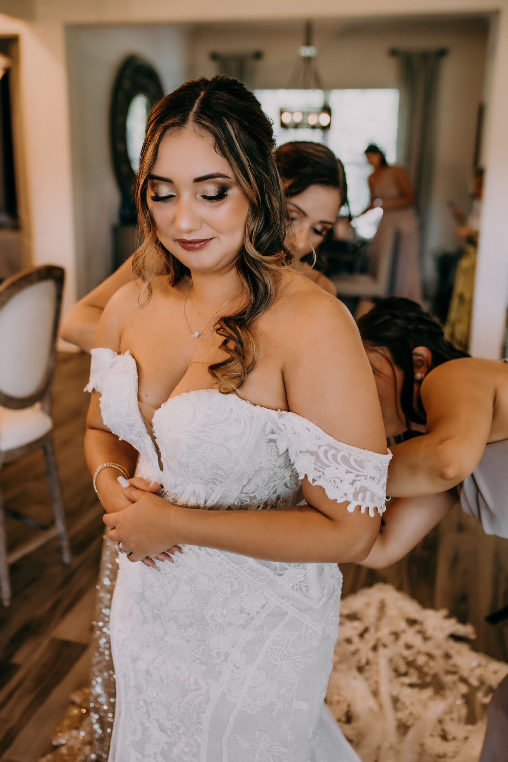 Boho Vintage Bride Getting Wedding Ready Wearing Off the Shoulder Lace and Illusion Wedding Dress