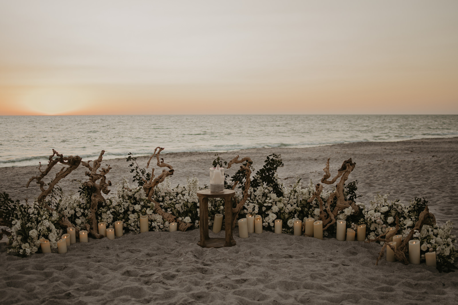 Sunset Romantic Driftwood Candle Light Beach Wedding Ceremony Decor Inspiration | Longboat Key Zota Beach Resort