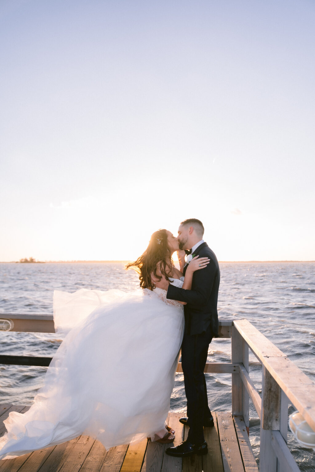 Bride and Groom Waterfront Wedding Portrait at Sunset | Tampa Bay Wedding Venue Beso Del Sol