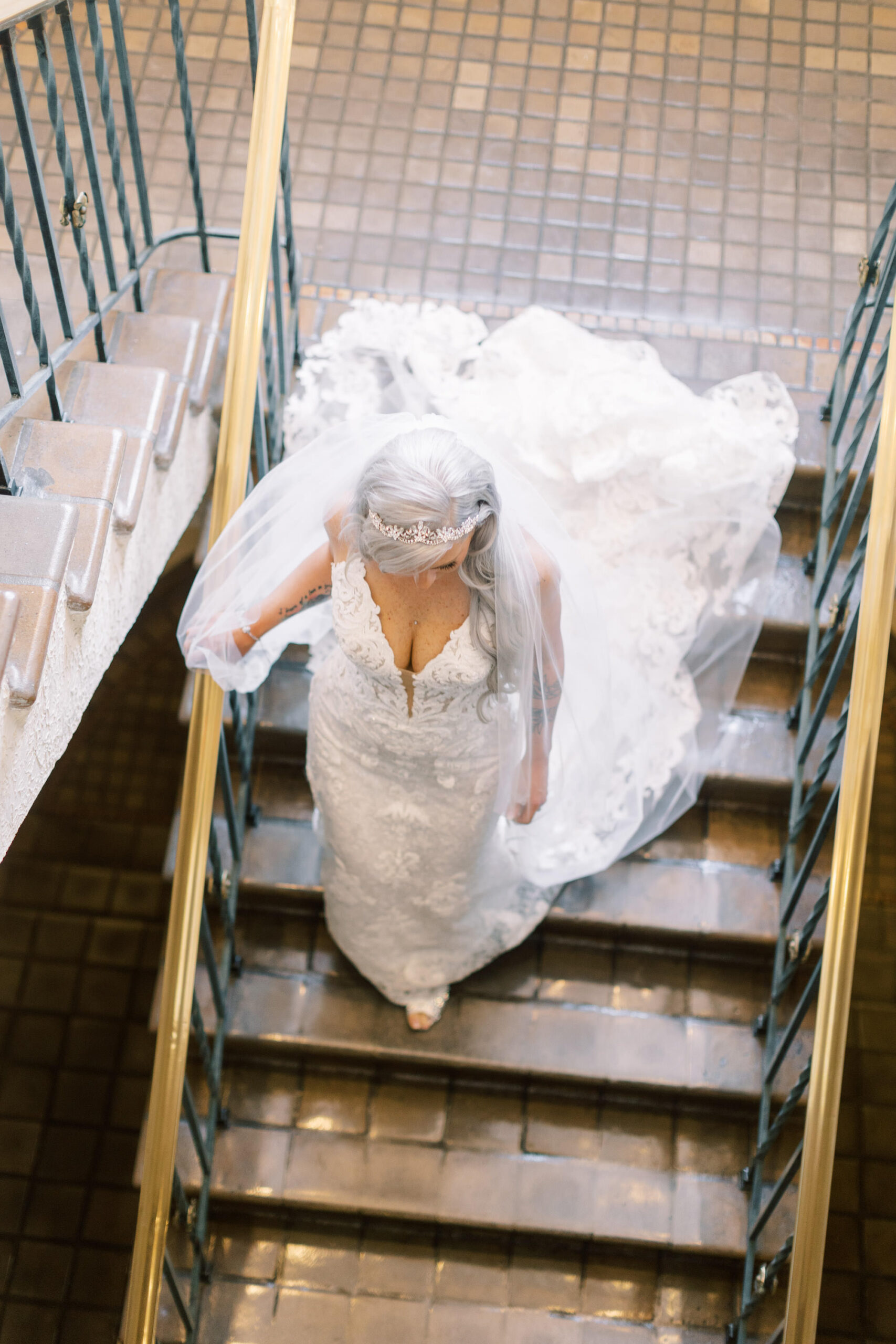 Bride Walking Down Stairs in White Lace Maggie Sottero Spaghetti Strap Mermaid Wedding Dress