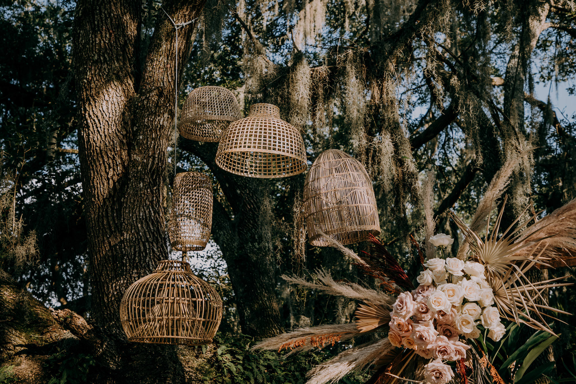 Boho Vintage Wedding Ceremony Decor, Rattan, Wicker Lantern Shades Hanging on Trees | Tampa Bay Wedding Planner Stephany Perry Events