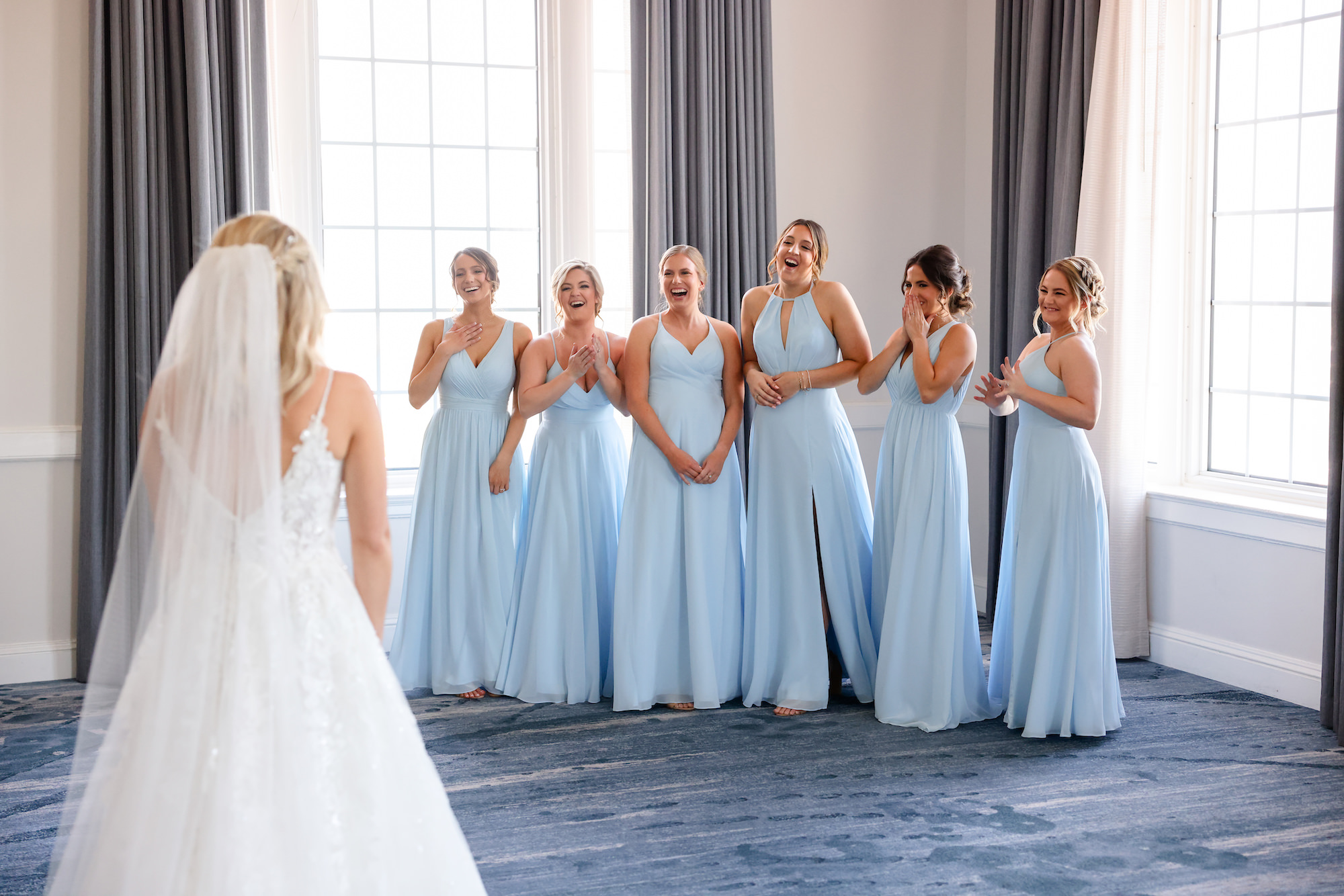 Bridemaids First Reaction to Bride Wedding Portrait