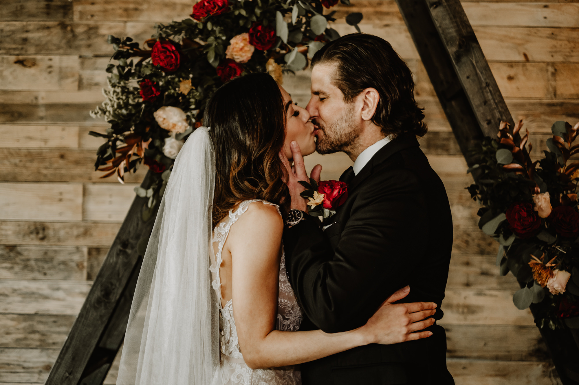 Bride and Groom First Kiss Wedding Portrait