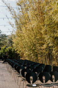 Modern Black Wedding Ceremony Chair Ideas in Outdoor Bamboo Garden