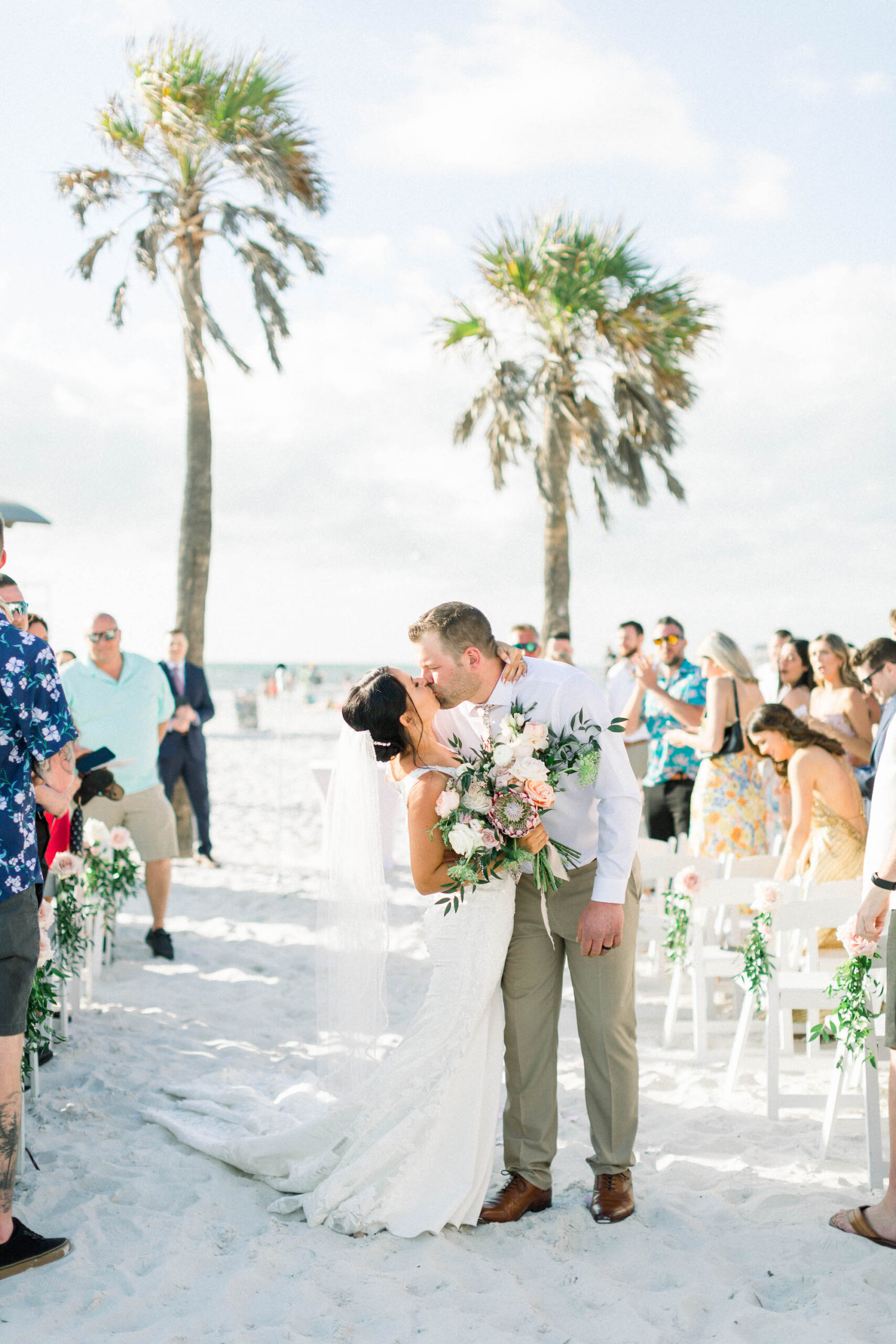 Bride and Groom Beach Ceremony Kiss Wedding Portrait