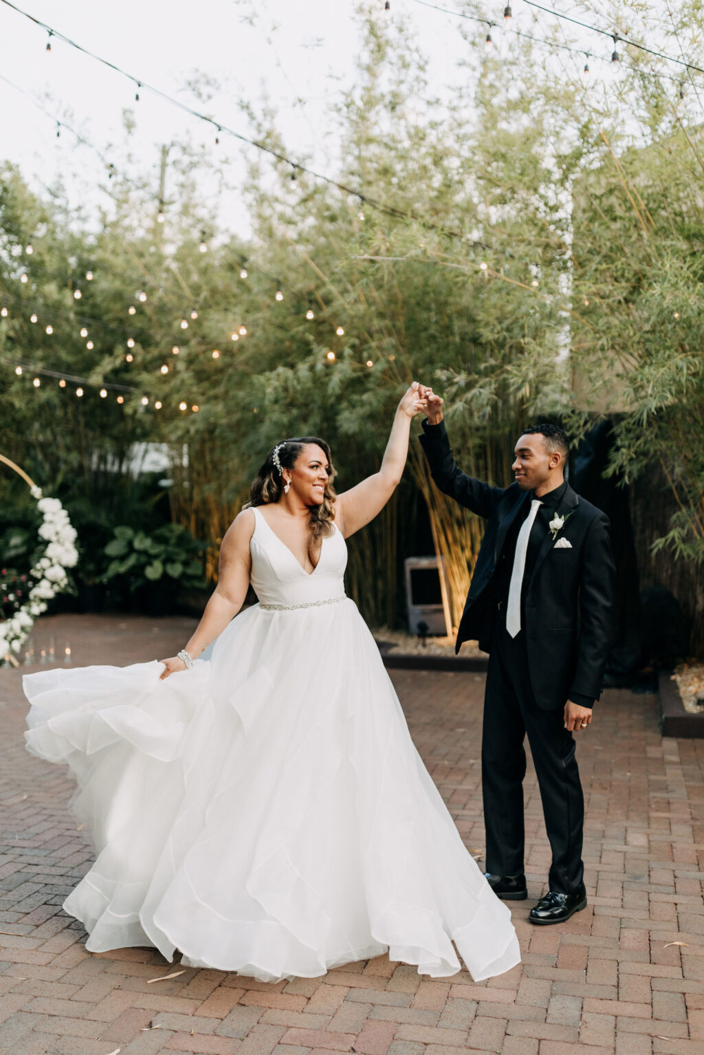 Romantic Classic Bride and Groom Dancing in Bamboo Courtyard of Unique Downtown Tampa Wedding Venue NOVA 535 | Wedding Photographer Amber McWhorter Photograpy