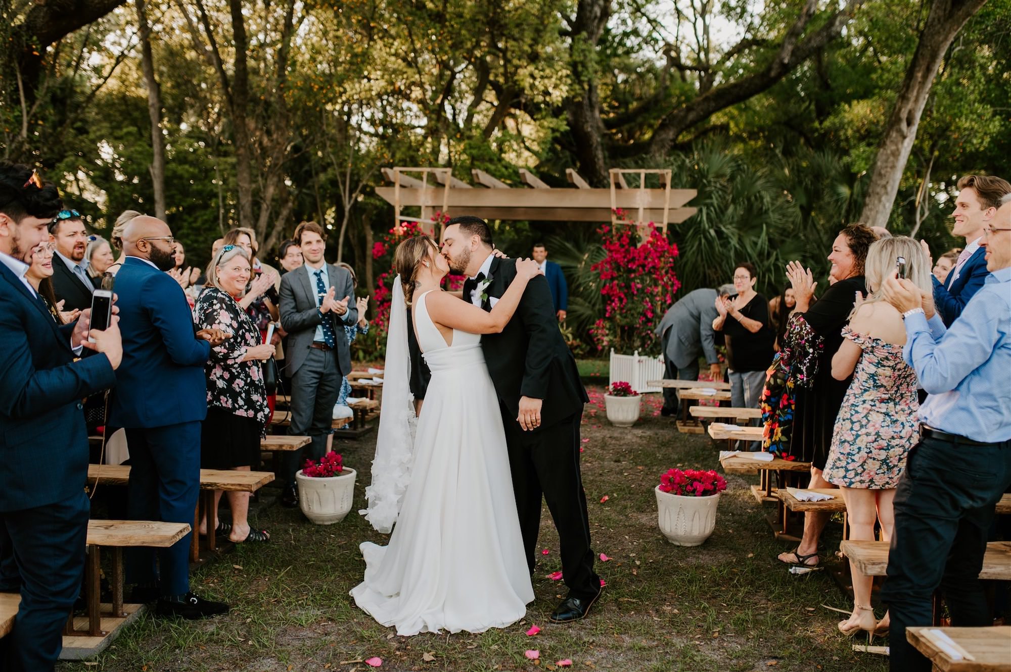 Bride and Groom Wedding Ceremony Kiss Portrait | Tampa Bay Wedding Venue Tabellas at Delaney Creek