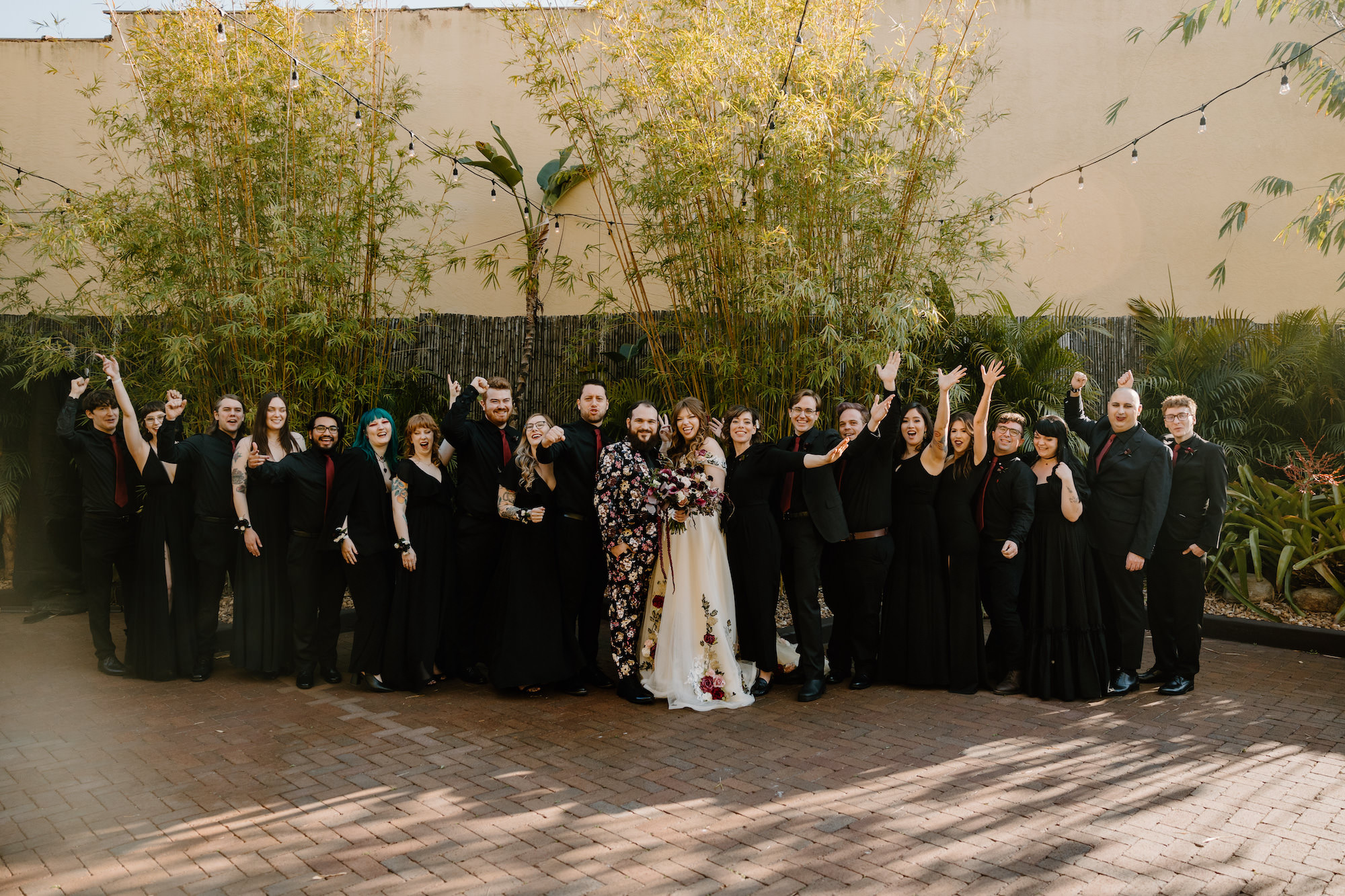 Dark and Moody Goth Black and Red Wedding Bridal Party Attire Inspiration