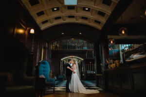 Dark and Moody Bride and Groom Wedding Portrait | Tampa Bay Photography Iyrus Weddings | Venue Oxford Exchange