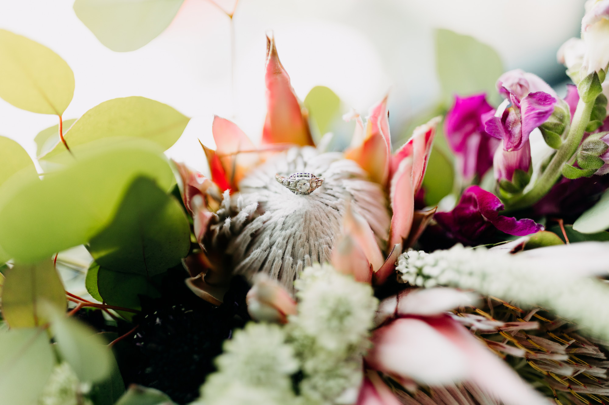 King Protea Bridal Bouquet with Wedding Rings | Sarasota Florist Beneva Weddings