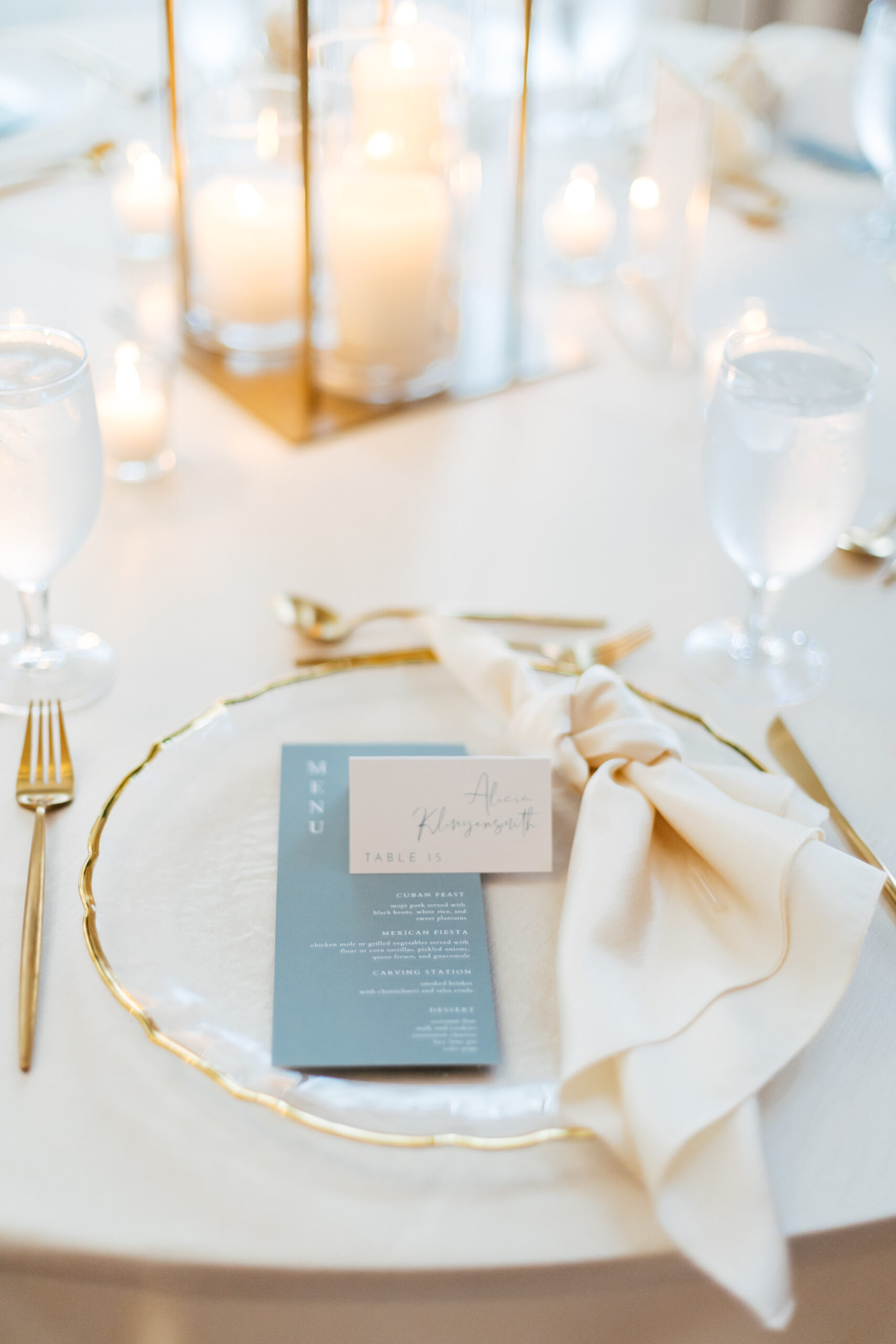 Romantic White Wedding Place Setting Inspiration, Gold-Rimmed Hammered Glass Chargers, Gold Flatware, Modern Menu Stationary, Gold Linen | Tampa Bay Wedding Decor Kate Ryan Event Rentals