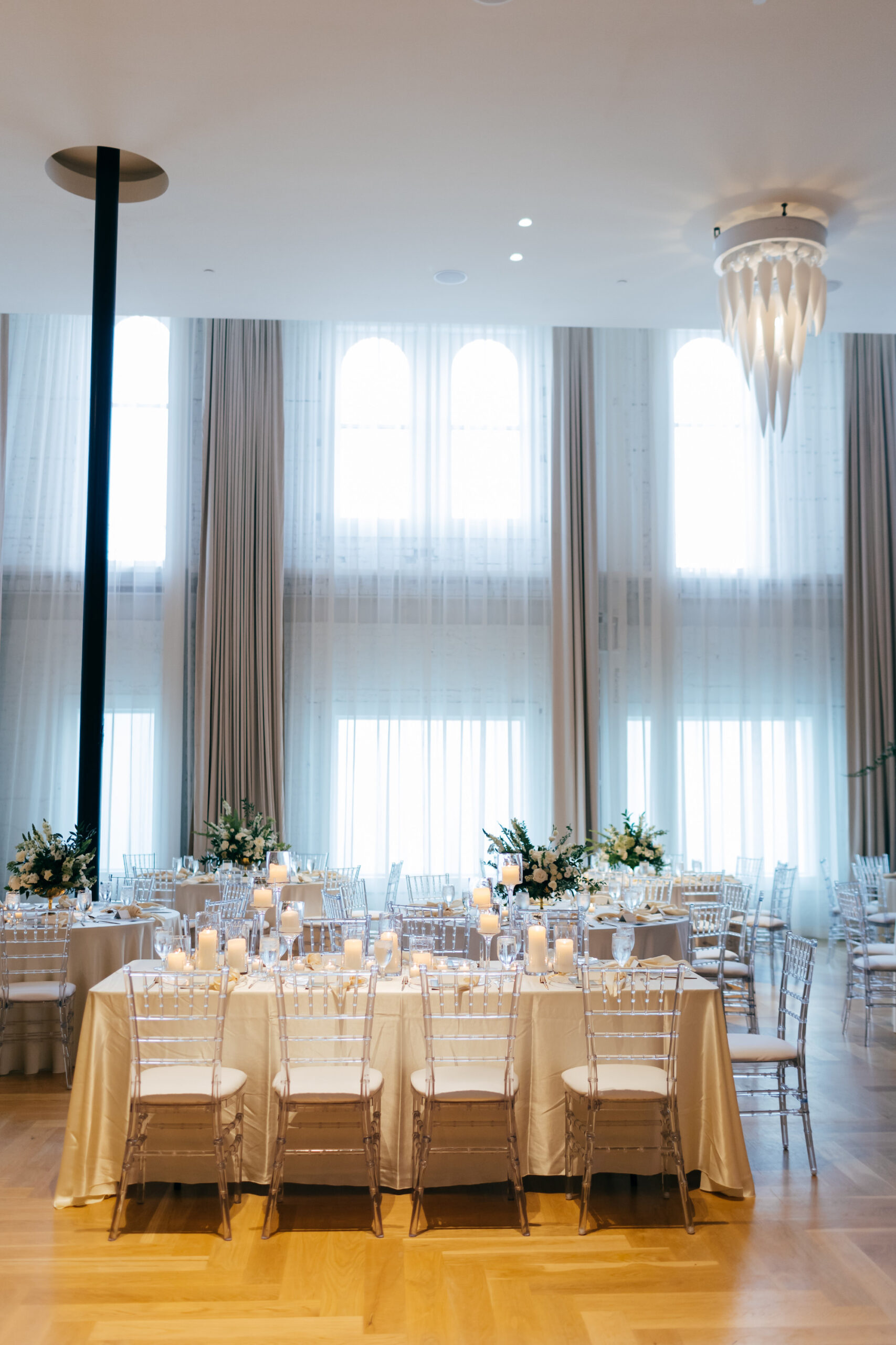 Modern White Ballroom Reception with Clear Chiavari Wedding Reception Chairs | Tampa Bay Rental Kate Ryan Event Rentals | Venue Hotel Haya