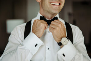 Groom Getting Ready Wedding Portrait | Modern Black Cuff Links | Black Suspenders and Bowtie