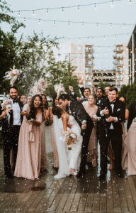 Bride and Groom Champagne Toast and Spray Bridal Party Photo Inspiration | Tampa Bay Videographer J&S Media