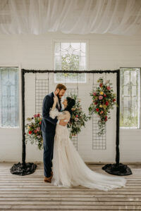 Black Modern Hanging Floral Arrangement Wedding Ceremony Altar | Tampa Bay Florist Monarch Events and Design | Venue Cross Creek Ranch